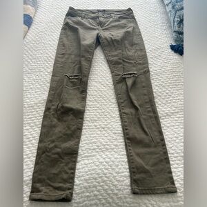 Olive green skinny jeans.
